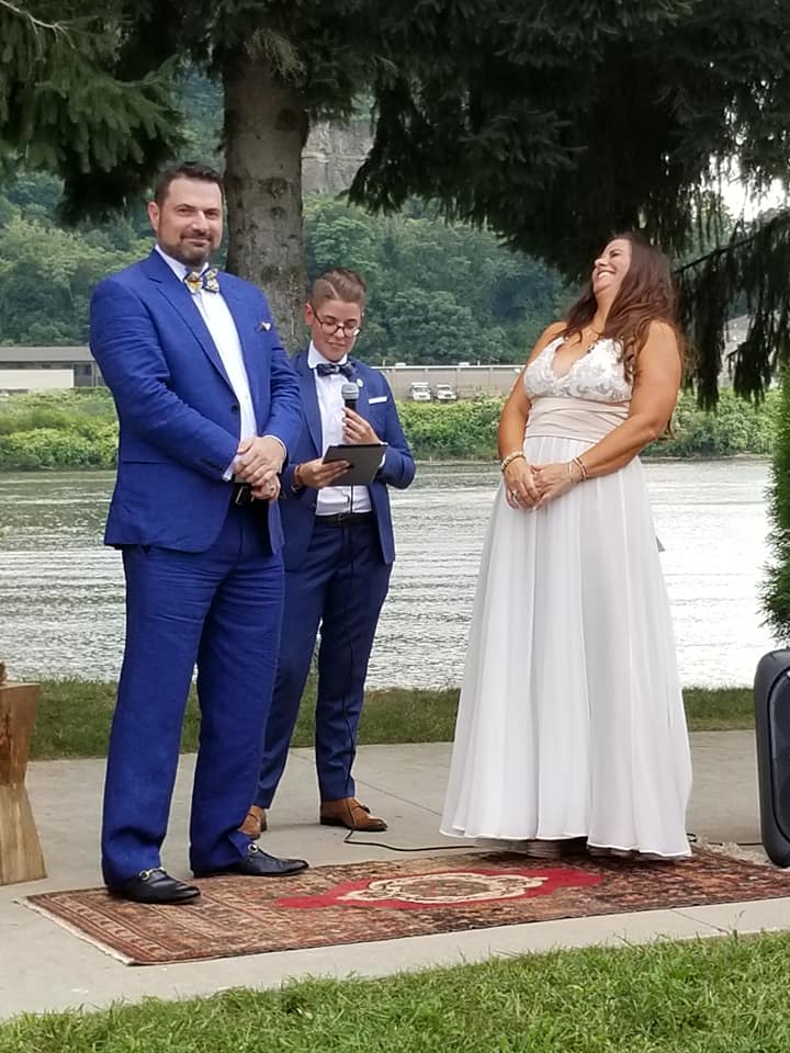 Leading a wedding ceremony.
